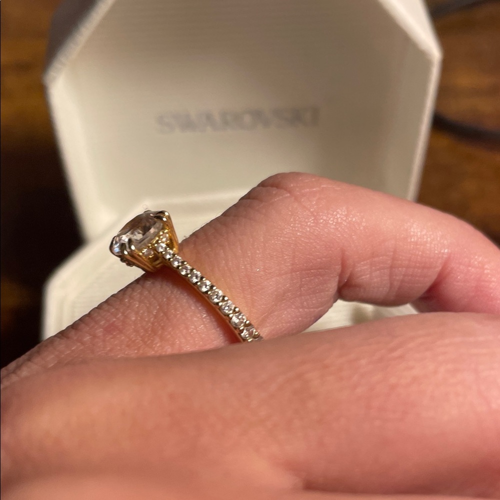 Swarovski Gold-Tone Ring with Sparkling Crystal - Picture 5 of 8